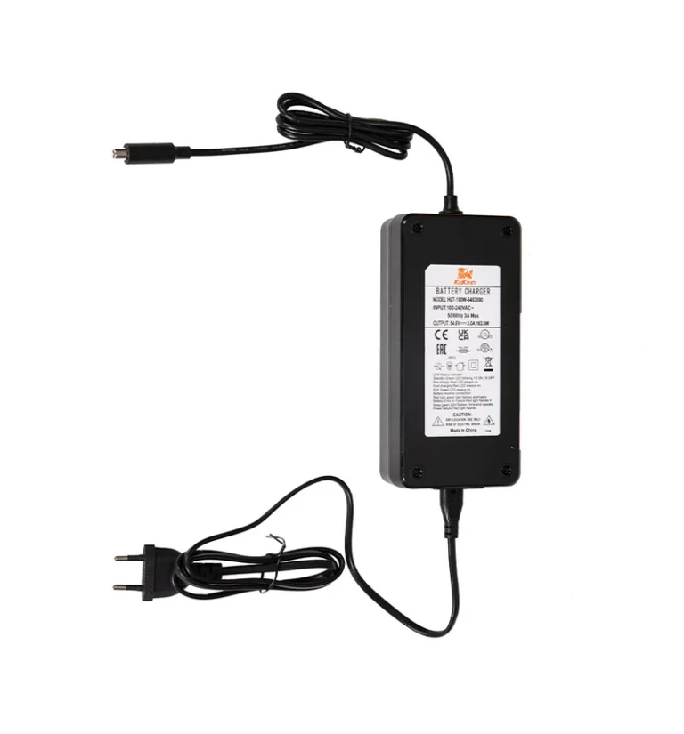 KuKirin C1 Pro charger, manual, and tools laid out