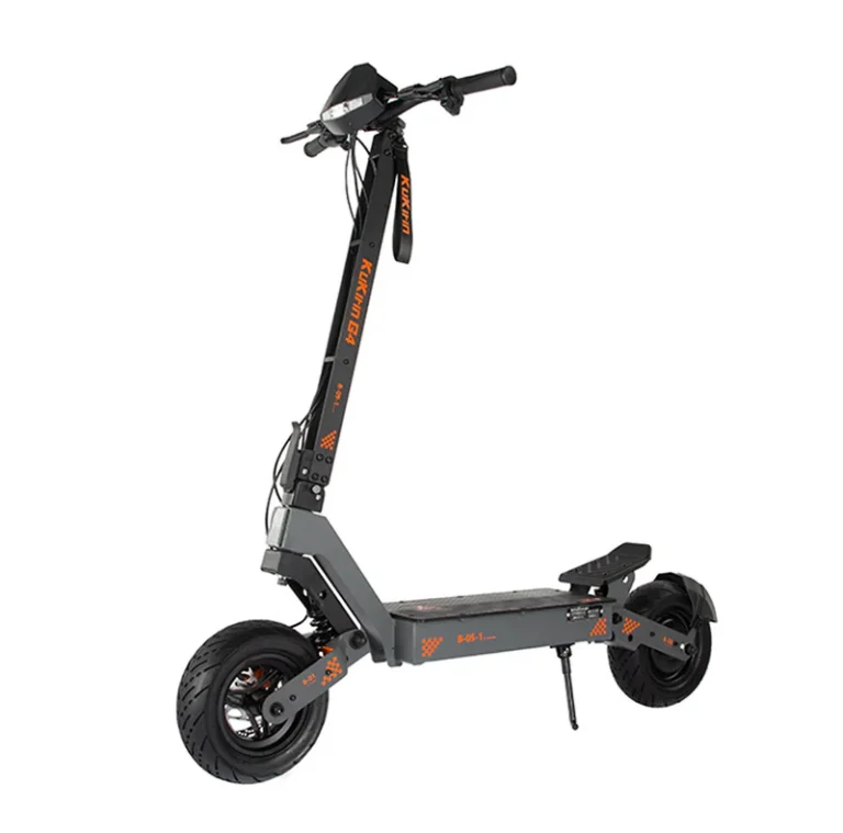 Person riding KuKirin G4 scooter on urban road